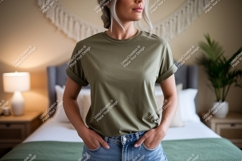 Woman wearing olive green t shirt and denim image Product Image 1