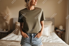 Woman wearing olive green t shirt and denim shorts Product Image 1