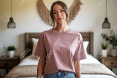 Woman wearing pink t shirt and jeans image Product Image 1