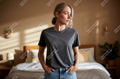Woman wearing charcoal t shirt and denim image Product Image 1