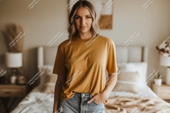 Woman wearing mustard yellow t shirt and denim shorts Product Image 1