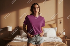 Woman wearing plum t shirt and denim shorts image Product Image 1
