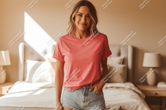 Woman wearing coral t shirt and denim shorts image Product Image 1