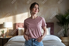 Woman wearing pink t shirt and jeans image Product Image 1
