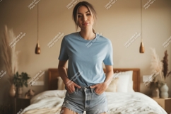 Woman wearing blue t shirt and denim shorts image Product Image 1