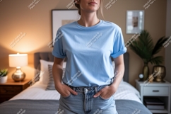 Woman wearing light blue t shirt and denim shorts t-shirt Product Image 1