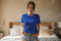 Woman wearing blue t shirt and denim shorts t-shirt Product Image 1