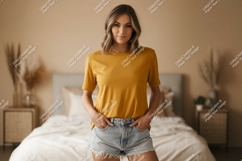 Woman wearing mustard t shirt and denim shorts Product Image 1