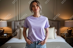 Woman wearing lavender t shirt and denim image Product Image 1
