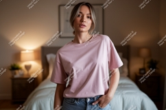 Woman wearing pink t shirt and jeans image Product Image 1