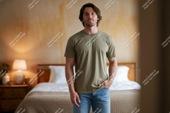 Man wearing olive t shirt and jeans image Product Image 1