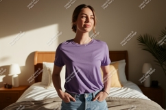 Woman wearing purple t shirt and denim shorts image Product Image 1