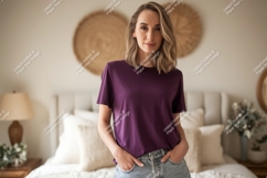 Woman wearing purple t shirt denim Product Image 1