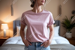 Woman wearing pink t shirt and jeans image Product Image 1
