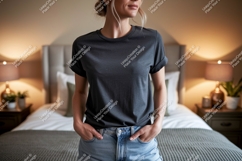 Woman wearing dark grey t shirt and denim jeans image Product Image 1