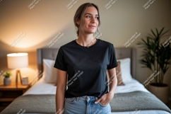 Woman wearing black t shirt and jeans t-shirt indoor Product Image 1