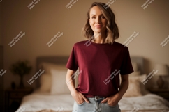 Woman wearing maroon t shirt and denim shorts image Product Image 1