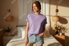 Woman wearing lavender t shirt and denim shorts image Product Image 1