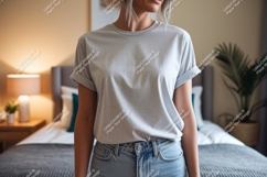 Woman wearing grey t shirt and denim jeans image Product Image 1