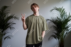 Young man peace sign khaki t shirt image Product Image 1