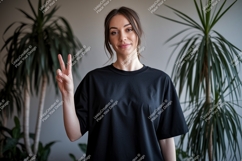 Woman wearing black t shirt peace sign image Product Image 1