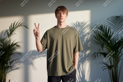 Young man peace sign olive shirt male person Product Image 1