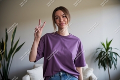 Woman wearing purple t shirt peace sign image Product Image 1