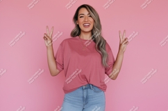 Woman peace sign gesture pink shirt Product Image 1