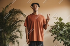 Man wearing terracotta t shirt peace sign image Product Image 1