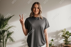 Woman wearing dark grey t shirt peace sign image Product Image 1