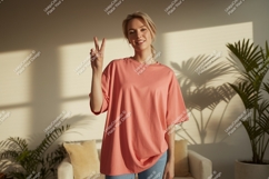 Woman wearing coral t shirt peace sign image Product Image 1