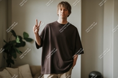 Man wearing dark t shirt making peace sign t-shirt Product Image 1