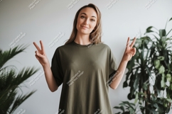 Woman peace sign green shirt mockup image Product Image 1