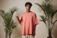 Young man wearing coral t shirt and beige shorts male Product Image 1
