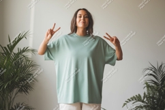 Woman wearing pastel green t shirt peace sign image Product Image 1