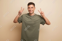 Man wearing olive green t shirt with peace sign Product Image 1