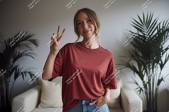 Woman wearing red t-shirt and jeans Product Image 1