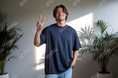 Man wearing dark t shirt peace sign plants image Product Image 1