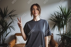 Woman wearing dark grey t shirt peace sign image Product Image 1