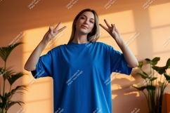 Woman blue t shirt peace gesture image Product Image 1