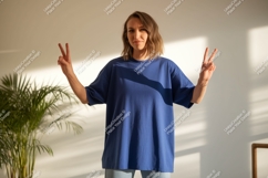 Woman wearing blue t shirt peace sign image Product Image 1