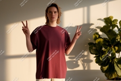 Person wearing maroon t shirt mockup Product Image 1