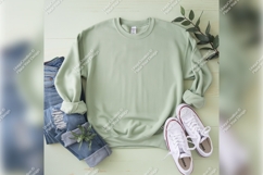 Light Green Sweatshirt Flat Lay With Jeans And Sneakers Product Image 1