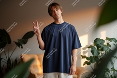 Young man wearing navy t-shirt peace sign Product Image 1