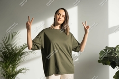 Woman green t shirt peace sign image Product Image 1