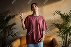 Woman wearing maroon t-shirt peace sign Product Image 1