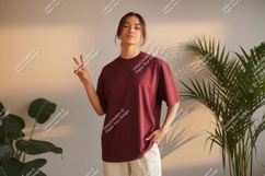 Woman wearing maroon t shirt peace sign image Product Image 1