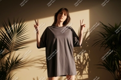 Woman wearing grey t shirt peace sign t-shirt Product Image 1
