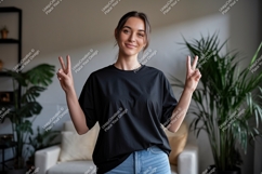 Woman wearing black t shirt peace sign image Product Image 1