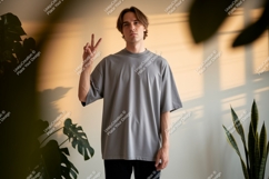 Man wearing grey t shirt peace sign t-shirt Product Image 1